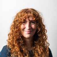 headshot of Rhia Thomas