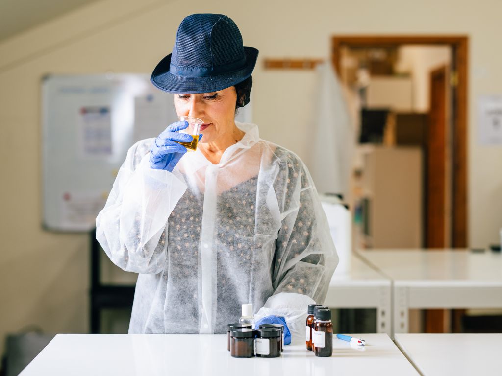 NSS staff smelling products for quality