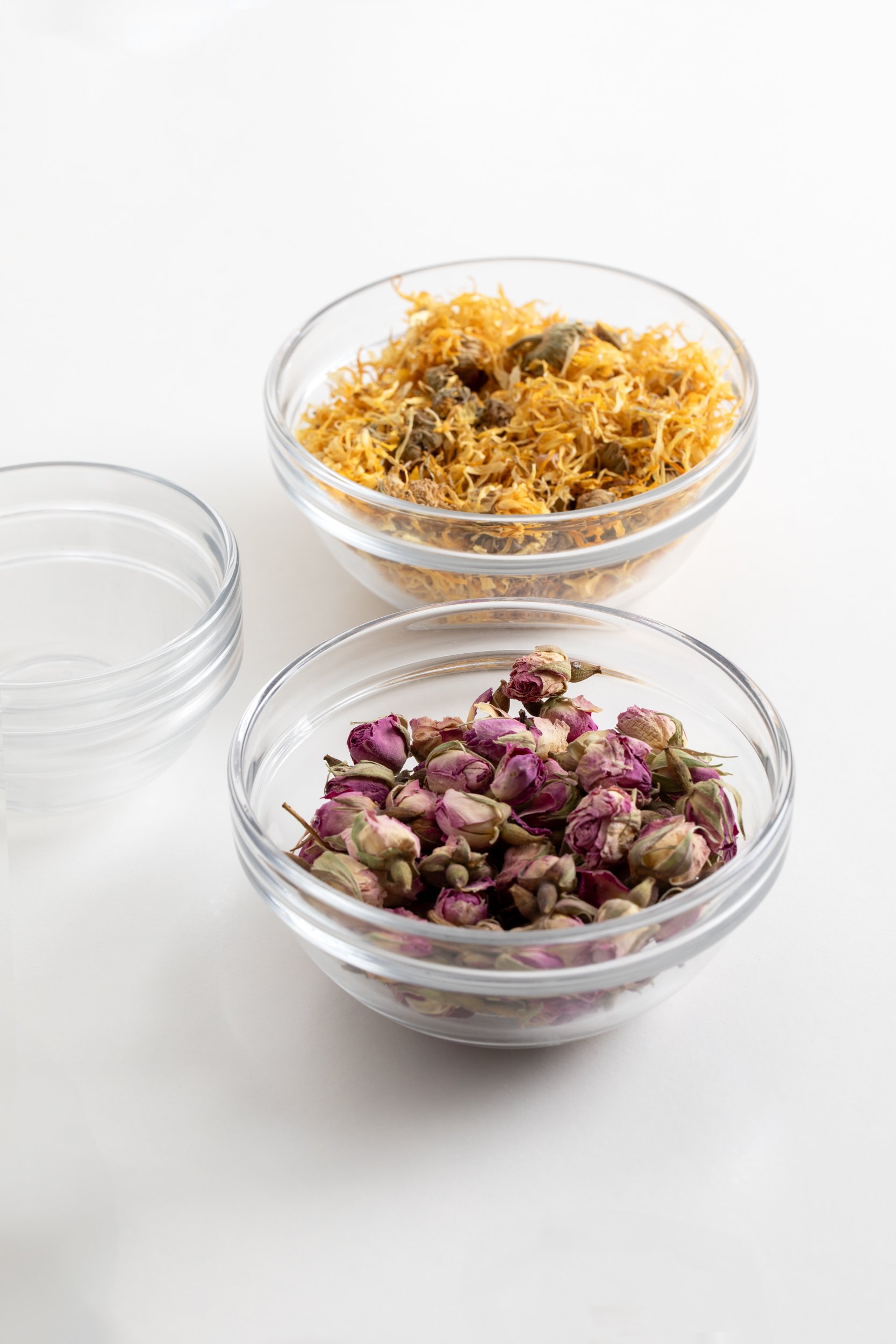 Organic flowers in glass dishes