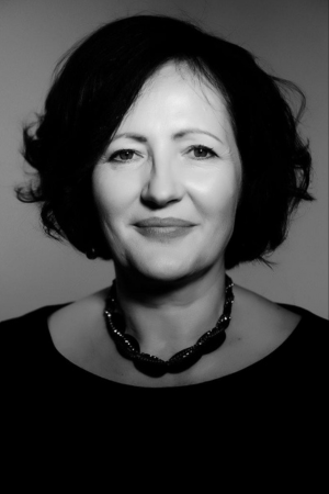 NSS leadership team member in a professional business setting